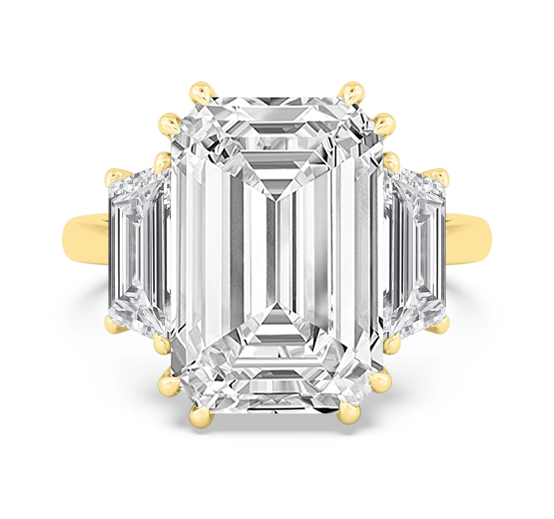 Three-stone trilogy engagement ring in white gold