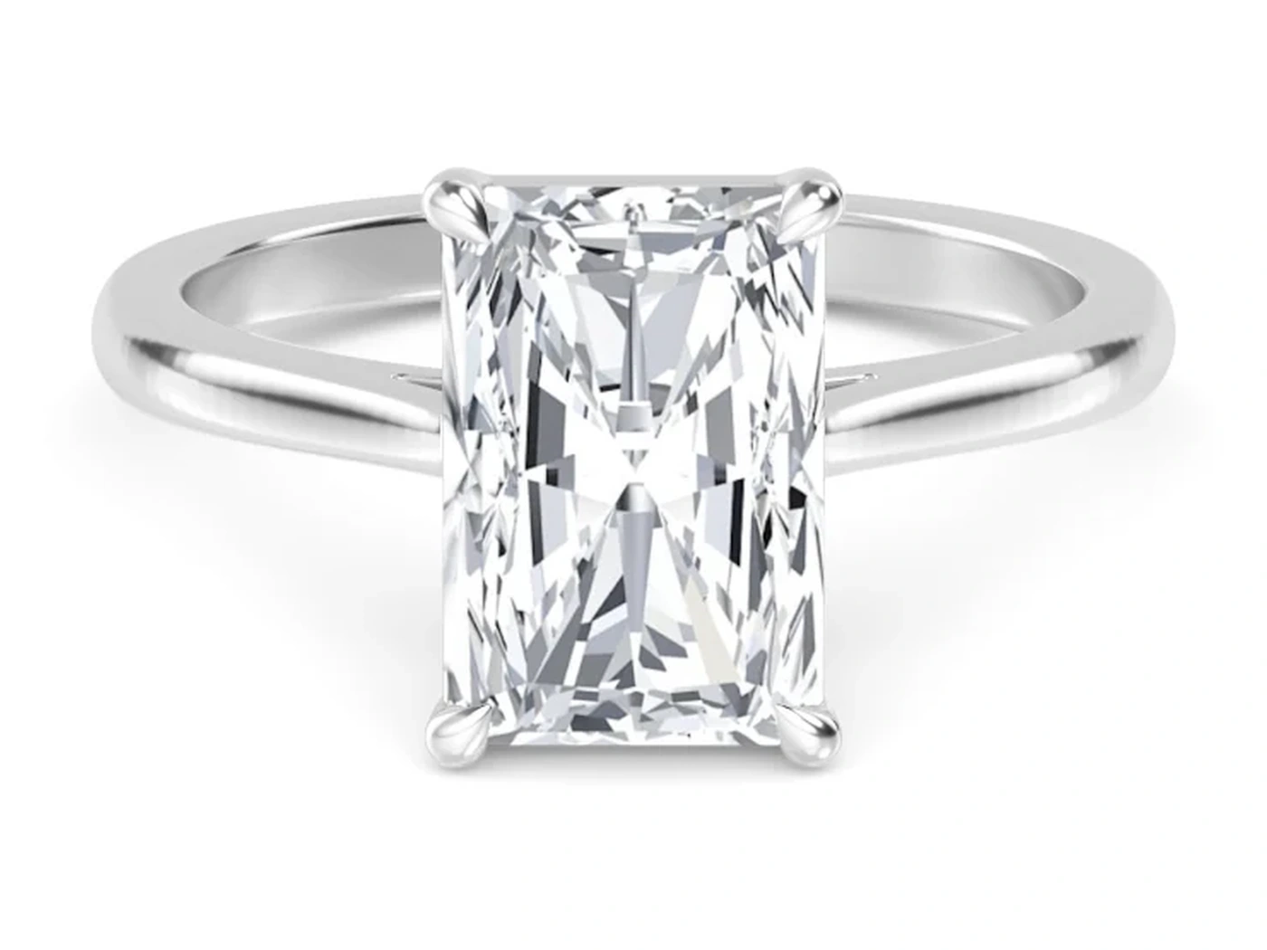 Solitaire engagement ring with a plain white gold band