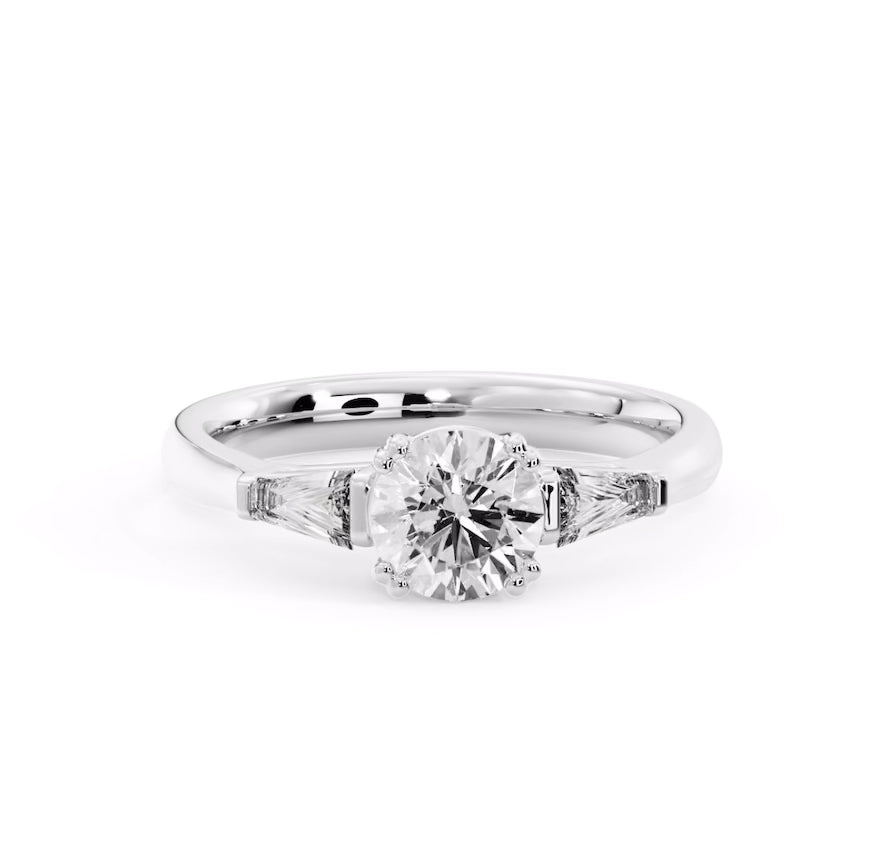 Three-stone style engagement ring in Australia